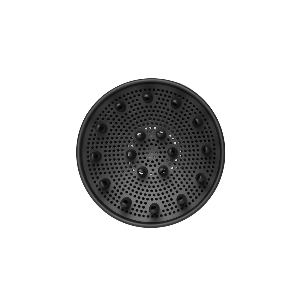 L'ange black diffuser attachment on a blank space
