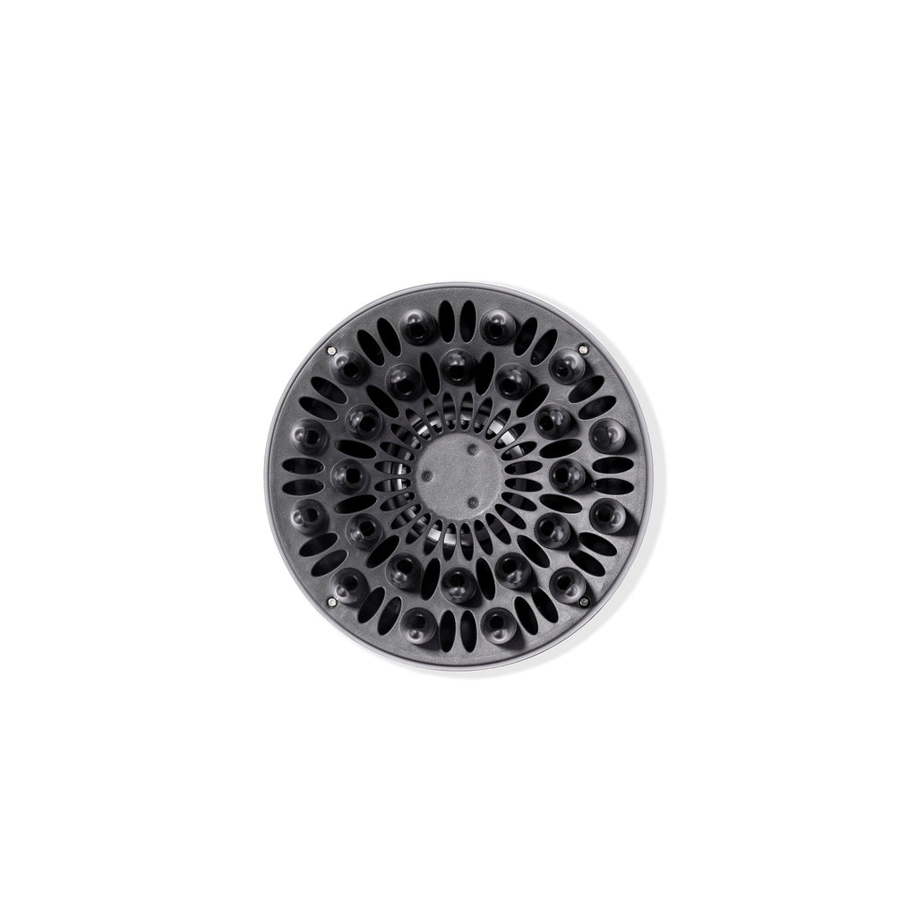 The vented side of the black Doux diffuser for Soleil is facing you so you can see the prongs.