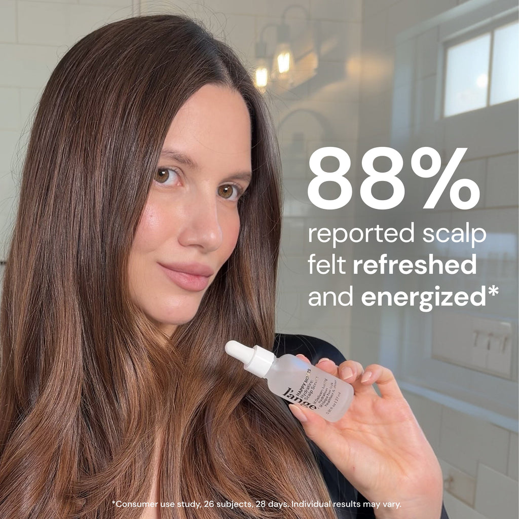 Woman holding Hydrating Scalp Serum with text "88% reported scalp felt refreshed and energized*"

*Consumer use study 26 subjects, 28 days. Individual results may vary