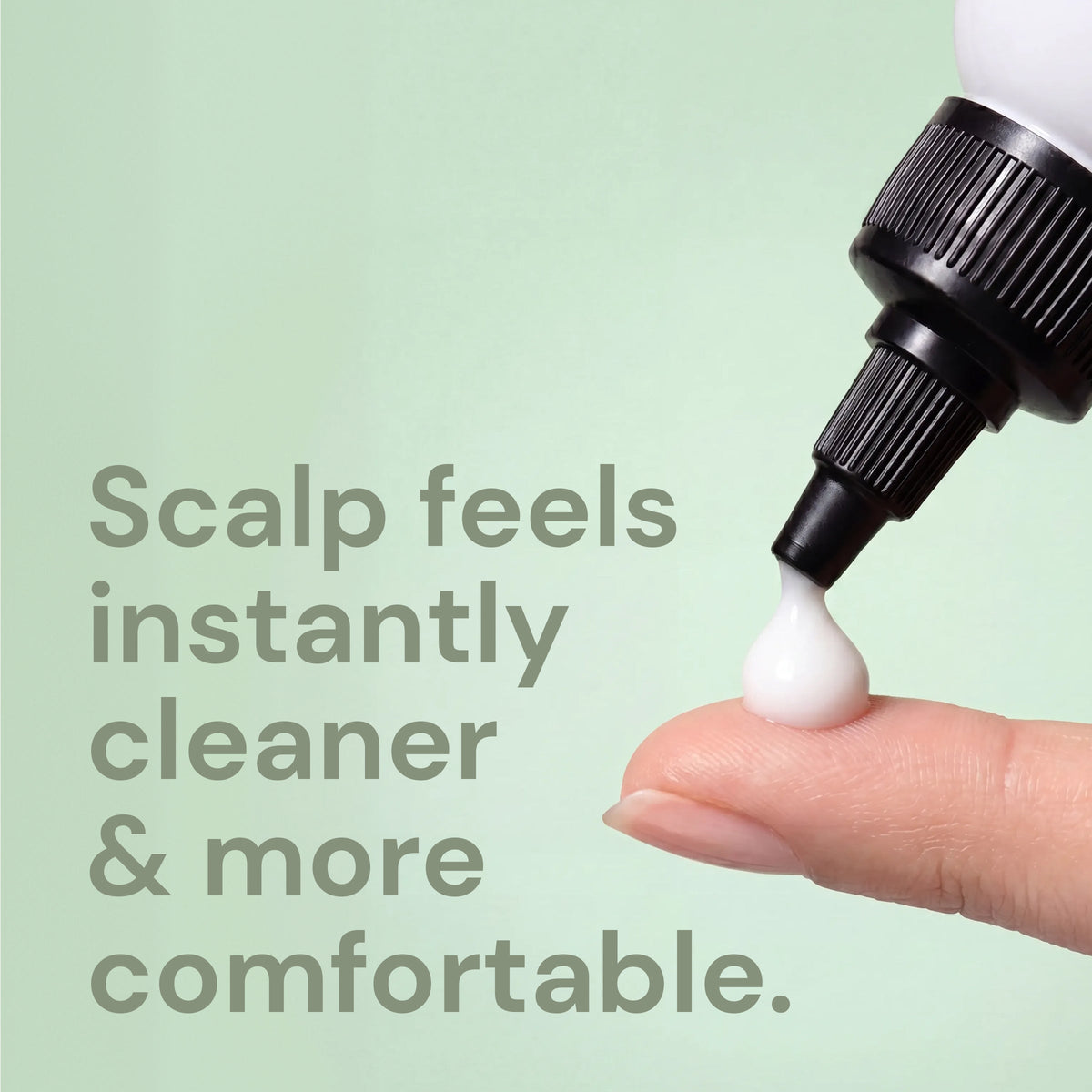 Dropper releasing a drop of cleanser onto a fingertip, with text "Scalp feels instantly cleaners & more comfortable"