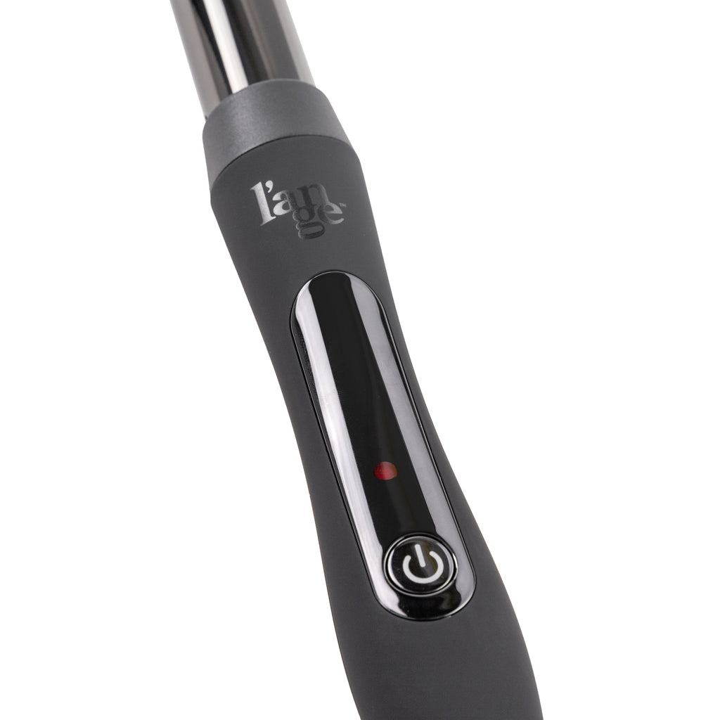Zoomed in view of black 25mm titanium barrel with soft touch ergonomic handles & black power button