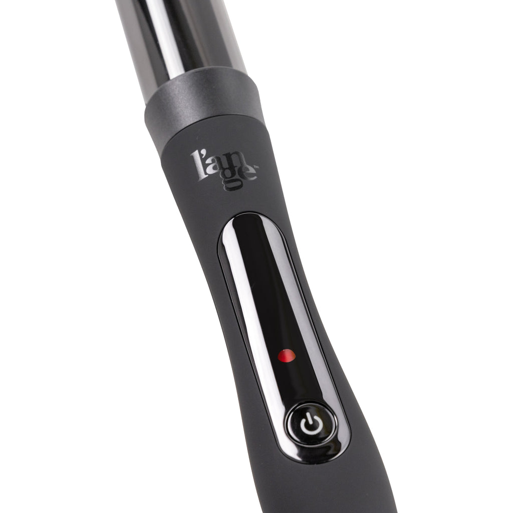 Zoomed in view of black 32mm titanium barrel with soft touch ergonomic handles & black power button