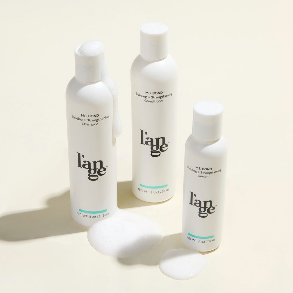 Ms. Bond System Value Set, featuring a Ms. Bond Shampoo, conditioner, and serum, displayed on a beige background