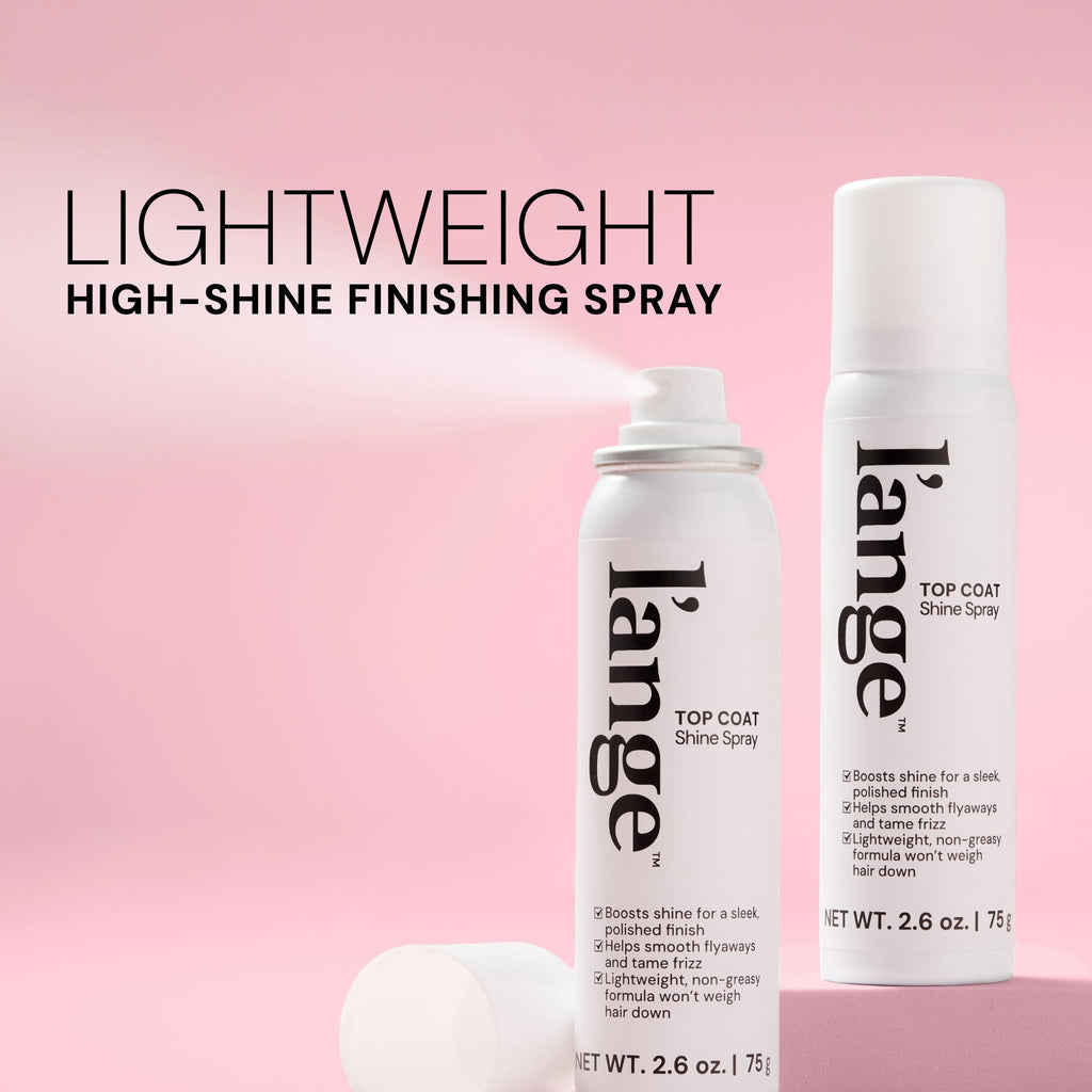 L’ange Top Coat high-shine finishing spray bottles on a pink background. Text reads "LIGHTWEIGHT. HIGH-SHINE FNISHING SPRAY"