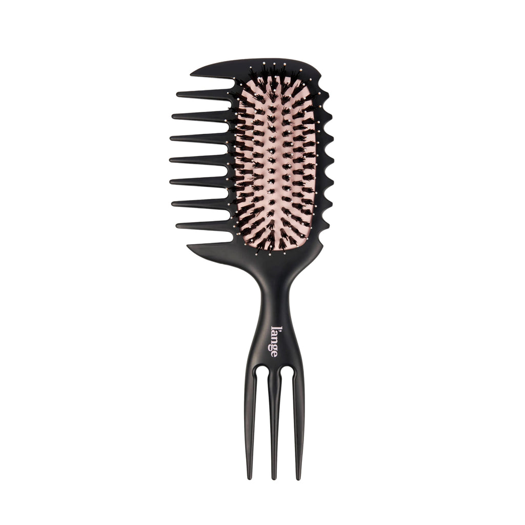 Curved detangling brush with wide-tooth side comb and triple-prong handle on a white background.