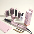 The Bombshell Blowout Value Set, featuring a Blush TurboStyle, Gloss Shock, Thermal Hair rollers, Heat resistant mat, and precision metal sectioning hair clips, displayed on a beige background